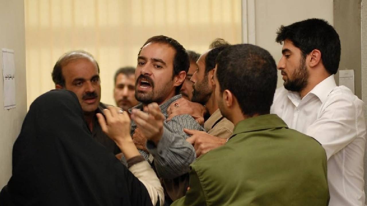 Shahab Hosseini as Hodjat in an intense courtroom confrontation scene in Asghar Farhadi's A Separation