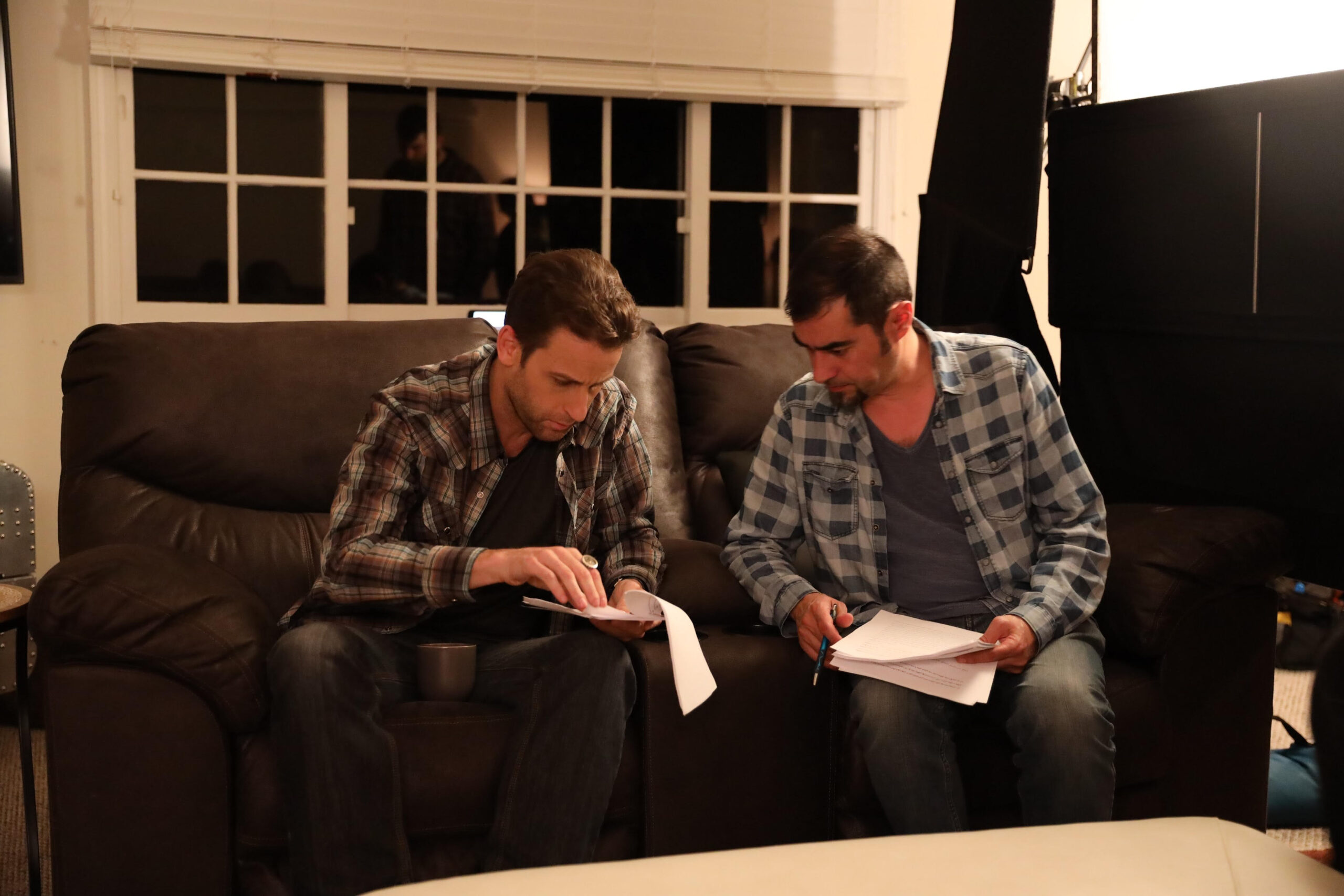 Shahab Hosseini and American actor on the set of "The Writer Is Dead"