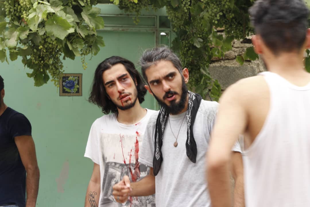 Director Amir Mohammad Nasiri Dehghan (right) and actor Sajjad Ahmadpoor on the set of "We Are to Blame"